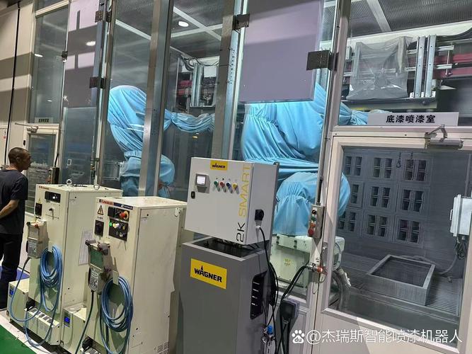 底漆喷漆室,我正在参观一个现代化的工厂,里面有高科技的喷漆设备.杰